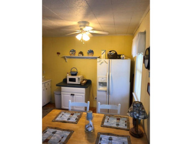 Cozy cottage with open floor plan and beachy feel.  Fully on Captains Cove Golf and Yacht Club in Virginia - for sale on GolfHomes.com, golf home, golf lot
