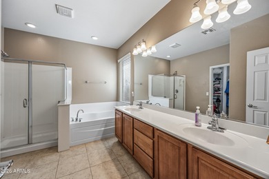 Welcome home to this spacious five-bedroom, three-bath home in on Poston Butte Golf Club in Arizona - for sale on GolfHomes.com, golf home, golf lot