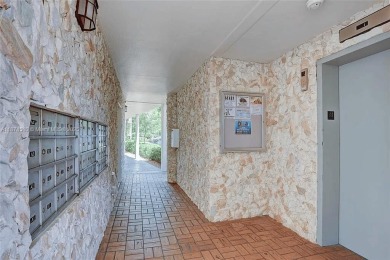 Enjoy resort-style living in Wynmoor's sought-after Antigua I on Wynmoor Golf Course in Florida - for sale on GolfHomes.com, golf home, golf lot