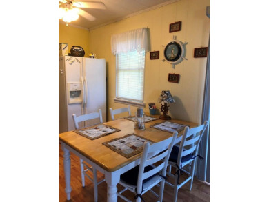 Cozy cottage with open floor plan and beachy feel.  Fully on Captains Cove Golf and Yacht Club in Virginia - for sale on GolfHomes.com, golf home, golf lot