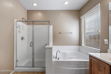 Welcome home to this spacious five-bedroom, three-bath home in on Poston Butte Golf Club in Arizona - for sale on GolfHomes.com, golf home, golf lot