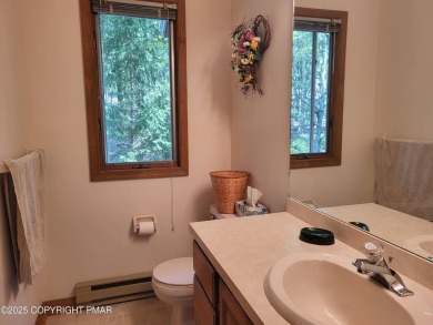 Welcome to your dream retreat! This charming 3-bedroom on Split Rock Resort and Country Club in Pennsylvania - for sale on GolfHomes.com, golf home, golf lot