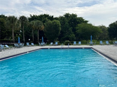 Enjoy resort-style living in Wynmoor's sought-after Antigua I on Wynmoor Golf Course in Florida - for sale on GolfHomes.com, golf home, golf lot