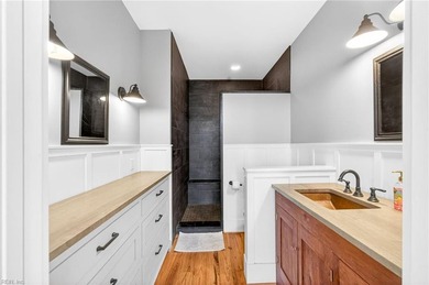 Experience premier coastal living in this elevator-accessible on Bay Creek Golf Club in Virginia - for sale on GolfHomes.com, golf home, golf lot