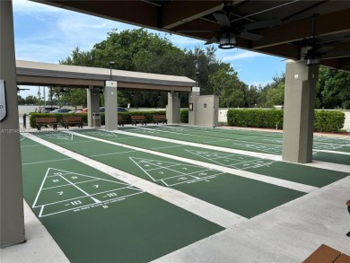 Enjoy resort-style living in Wynmoor's sought-after Antigua I on Wynmoor Golf Course in Florida - for sale on GolfHomes.com, golf home, golf lot