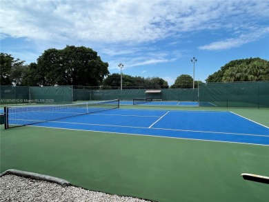 Enjoy resort-style living in Wynmoor's sought-after Antigua I on Wynmoor Golf Course in Florida - for sale on GolfHomes.com, golf home, golf lot