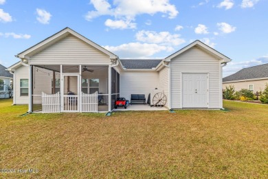 Welcome to this almost-new, stunning single-story home nestled on Bear Trail Golf Club in North Carolina - for sale on GolfHomes.com, golf home, golf lot