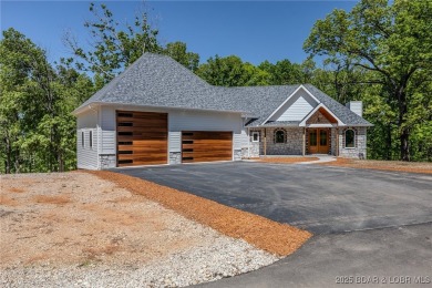 tep into the epitome of luxurious living at The Estates of on The Club At Old Kinderhook in Missouri - for sale on GolfHomes.com, golf home, golf lot