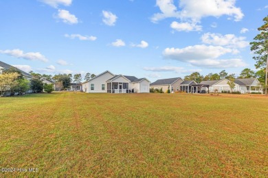 Welcome to this almost-new, stunning single-story home nestled on Bear Trail Golf Club in North Carolina - for sale on GolfHomes.com, golf home, golf lot