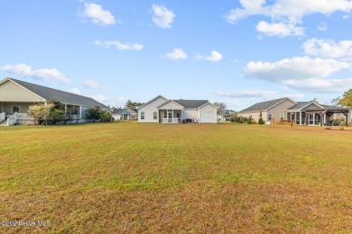 Welcome to this almost-new, stunning single-story home nestled on Bear Trail Golf Club in North Carolina - for sale on GolfHomes.com, golf home, golf lot