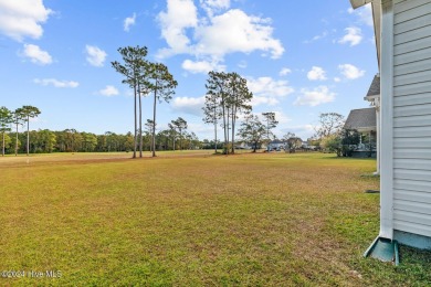 Welcome to this almost-new, stunning single-story home nestled on Bear Trail Golf Club in North Carolina - for sale on GolfHomes.com, golf home, golf lot