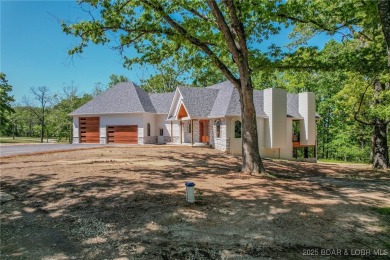 tep into the epitome of luxurious living at The Estates of on The Club At Old Kinderhook in Missouri - for sale on GolfHomes.com, golf home, golf lot