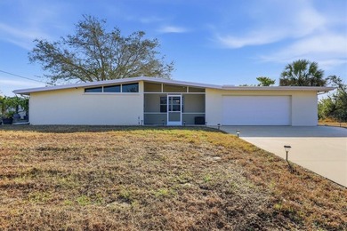 Pride of ownership shines in this well-maintained 1961 on Deep Creek Golf Club in Florida - for sale on GolfHomes.com, golf home, golf lot