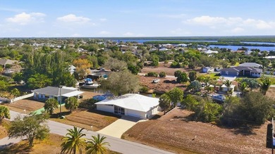 Pride of ownership shines in this well-maintained 1961 on Deep Creek Golf Club in Florida - for sale on GolfHomes.com, golf home, golf lot