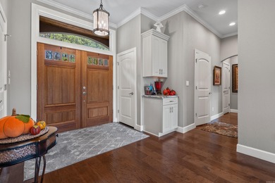 Custom-built beauty overlooking the 11th green of Granada Golf on Granada Golf Course in Arkansas - for sale on GolfHomes.com, golf home, golf lot