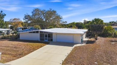 Pride of ownership shines in this well-maintained 1961 on Deep Creek Golf Club in Florida - for sale on GolfHomes.com, golf home, golf lot
