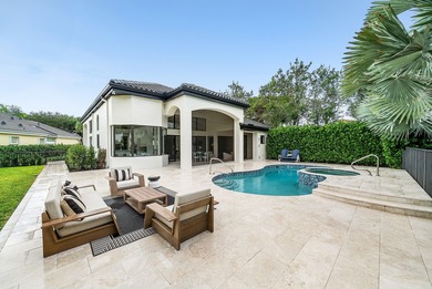 Beautifully updated single story residence on an oversized lot on BallenIsles Golf and Country Club in Florida - for sale on GolfHomes.com, golf home, golf lot