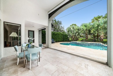 Beautifully updated single story residence on an oversized lot on BallenIsles Golf and Country Club in Florida - for sale on GolfHomes.com, golf home, golf lot