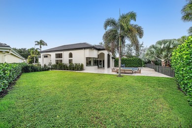 Beautifully updated single story residence on an oversized lot on BallenIsles Golf and Country Club in Florida - for sale on GolfHomes.com, golf home, golf lot