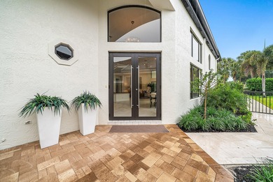 Beautifully updated single story residence on an oversized lot on BallenIsles Golf and Country Club in Florida - for sale on GolfHomes.com, golf home, golf lot