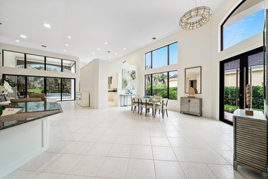 Beautifully updated single story residence on an oversized lot on BallenIsles Golf and Country Club in Florida - for sale on GolfHomes.com, golf home, golf lot