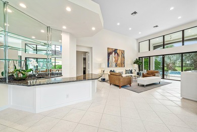 Beautifully updated single story residence on an oversized lot on BallenIsles Golf and Country Club in Florida - for sale on GolfHomes.com, golf home, golf lot