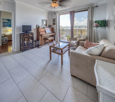 Discover your ultimate urban retreat in this one-bedroom on Lake Worth Municipal Golf Course in Florida - for sale on GolfHomes.com, golf home, golf lot