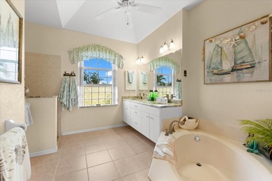 Enjoy stunning water views from nearly every angle of this on Rotonda Golf and Country Club - Long Marsh  in Florida - for sale on GolfHomes.com, golf home, golf lot