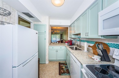 Discover your dream condo, perfectly nestled just 10 minutes on St. Petersburg Country Club in Florida - for sale on GolfHomes.com, golf home, golf lot