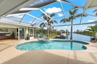 Enjoy stunning water views from nearly every angle of this on Rotonda Golf and Country Club - Long Marsh  in Florida - for sale on GolfHomes.com, golf home, golf lot