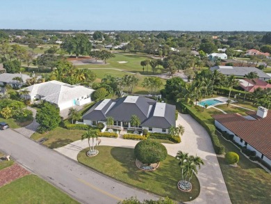 Nestled on an incredible 21,000 sq. ft. lot overlooking the on Atlantis Golf Club in Florida - for sale on GolfHomes.com, golf home, golf lot