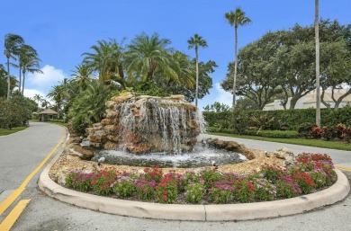 Nestled on an incredible 21,000 sq. ft. lot overlooking the on Atlantis Golf Club in Florida - for sale on GolfHomes.com, golf home, golf lot