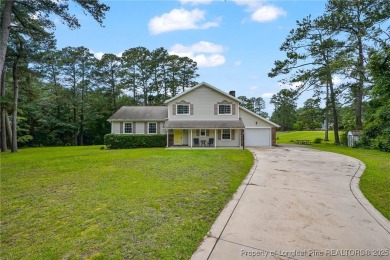 Welcome to this Gray's Creek tri-level cutie! On the main floor on Cypress Lakes Golf Course in North Carolina - for sale on GolfHomes.com, golf home, golf lot