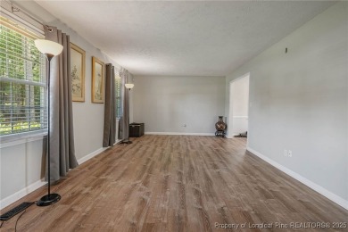 Welcome to this Gray's Creek tri-level cutie! On the main floor on Cypress Lakes Golf Course in North Carolina - for sale on GolfHomes.com, golf home, golf lot