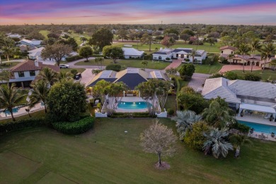 Nestled on an incredible 21,000 sq. ft. lot overlooking the on Atlantis Golf Club in Florida - for sale on GolfHomes.com, golf home, golf lot