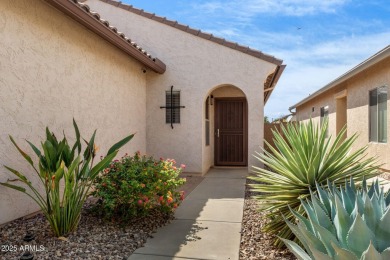 This charming home is so lovely and updated in all the right on Poston Butte Golf Club in Arizona - for sale on GolfHomes.com, golf home, golf lot