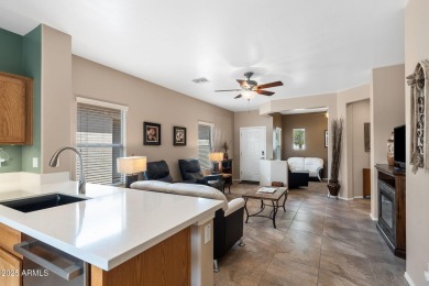 This charming home is so lovely and updated in all the right on Poston Butte Golf Club in Arizona - for sale on GolfHomes.com, golf home, golf lot