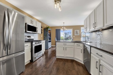 This beautifully updated 3-bedroom end-unit townhome in on Broken Arrow Golf Club in Illinois - for sale on GolfHomes.com, golf home, golf lot