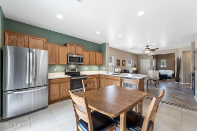This charming home is so lovely and updated in all the right on Poston Butte Golf Club in Arizona - for sale on GolfHomes.com, golf home, golf lot
