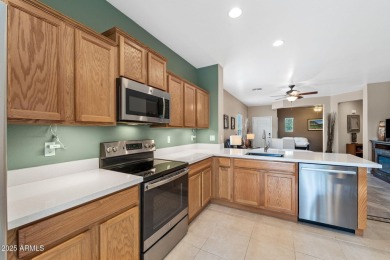 This charming home is so lovely and updated in all the right on Poston Butte Golf Club in Arizona - for sale on GolfHomes.com, golf home, golf lot