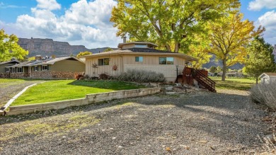 Nestled on the scenic Tiara Rado Golf Course, this unique on Tiara Rado Golf Course in Colorado - for sale on GolfHomes.com, golf home, golf lot