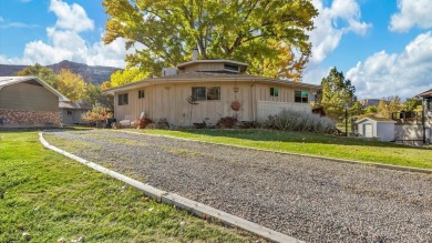 Nestled on the scenic Tiara Rado Golf Course, this unique on Tiara Rado Golf Course in Colorado - for sale on GolfHomes.com, golf home, golf lot