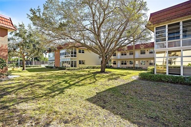 First-floor condo in Beautiful Vista Royale - a MUST SEE! This on The American Golf Club in Florida - for sale on GolfHomes.com, golf home, golf lot
