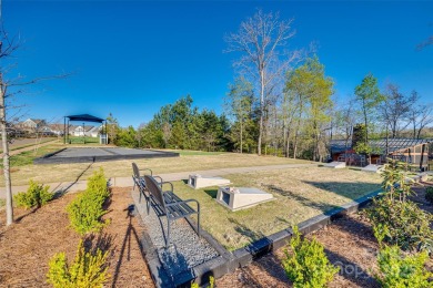This stunning home in the sought-after Edgewater community is on Edgewater Golf Club in South Carolina - for sale on GolfHomes.com, golf home, golf lot