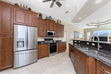 Trade Snow for Sunshine in This Rotonda West Pool Home! Now is on Rotonda Golf and Country Club - Long Marsh  in Florida - for sale on GolfHomes.com, golf home, golf lot