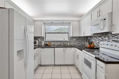 Located in the most exclusive, gated 55+ community of beautiful on Sunrise Lakes Phase IV Golf Course in Florida - for sale on GolfHomes.com, golf home, golf lot