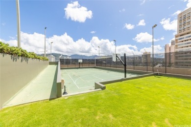 Tropical elegance meets urban convenience in this beautifully on Ala Wai Golf Course in Hawaii - for sale on GolfHomes.com, golf home, golf lot