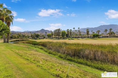 Discover this stunningly remodeled 2-bedroom, 2-bathroom condo on Cathedral Canyon Golf and Tennis Club in California - for sale on GolfHomes.com, golf home, golf lot