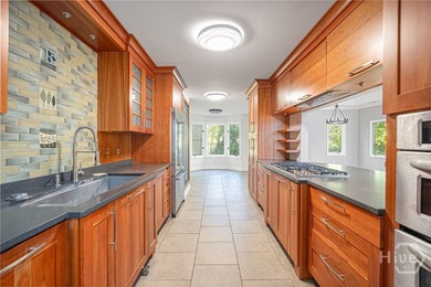 This beautiful 3-bedroom, 3-bath home w/ a bonus room offers the on The Landings Club - Marshwood in Georgia - for sale on GolfHomes.com, golf home, golf lot