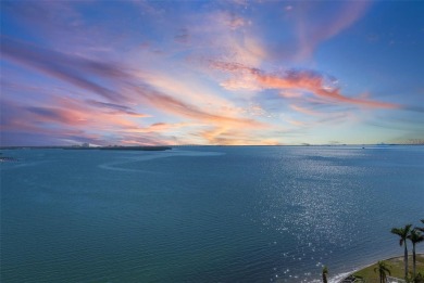 Yes, that really is the view from this unit! Balmy bay breezes on Isla Del Sol Yacht and Country Club in Florida - for sale on GolfHomes.com, golf home, golf lot